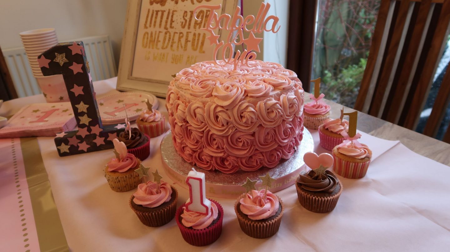 Twinkle Twinkle Little Star themed birthday party with swirl icing cake and cupcakes in pink