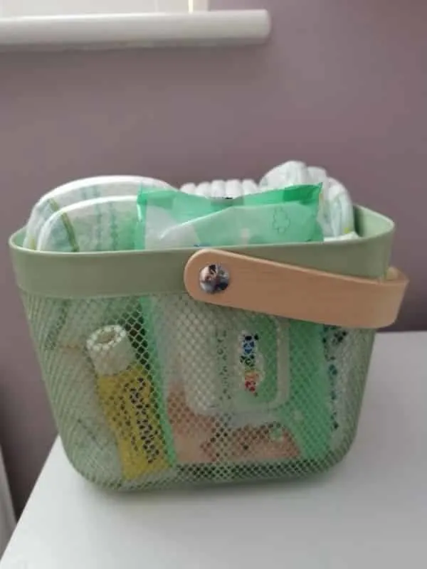 IKEA Risatorp metal basket for diapers and wipes - nursery hacks