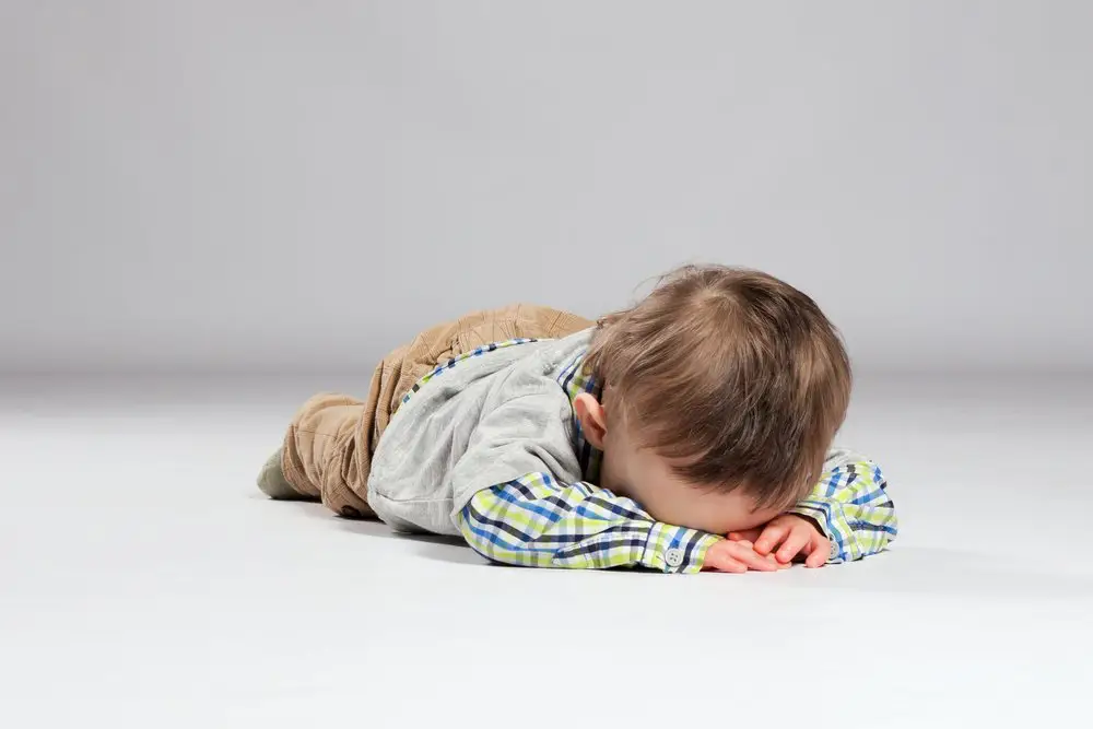 Tired toddler going to sleep