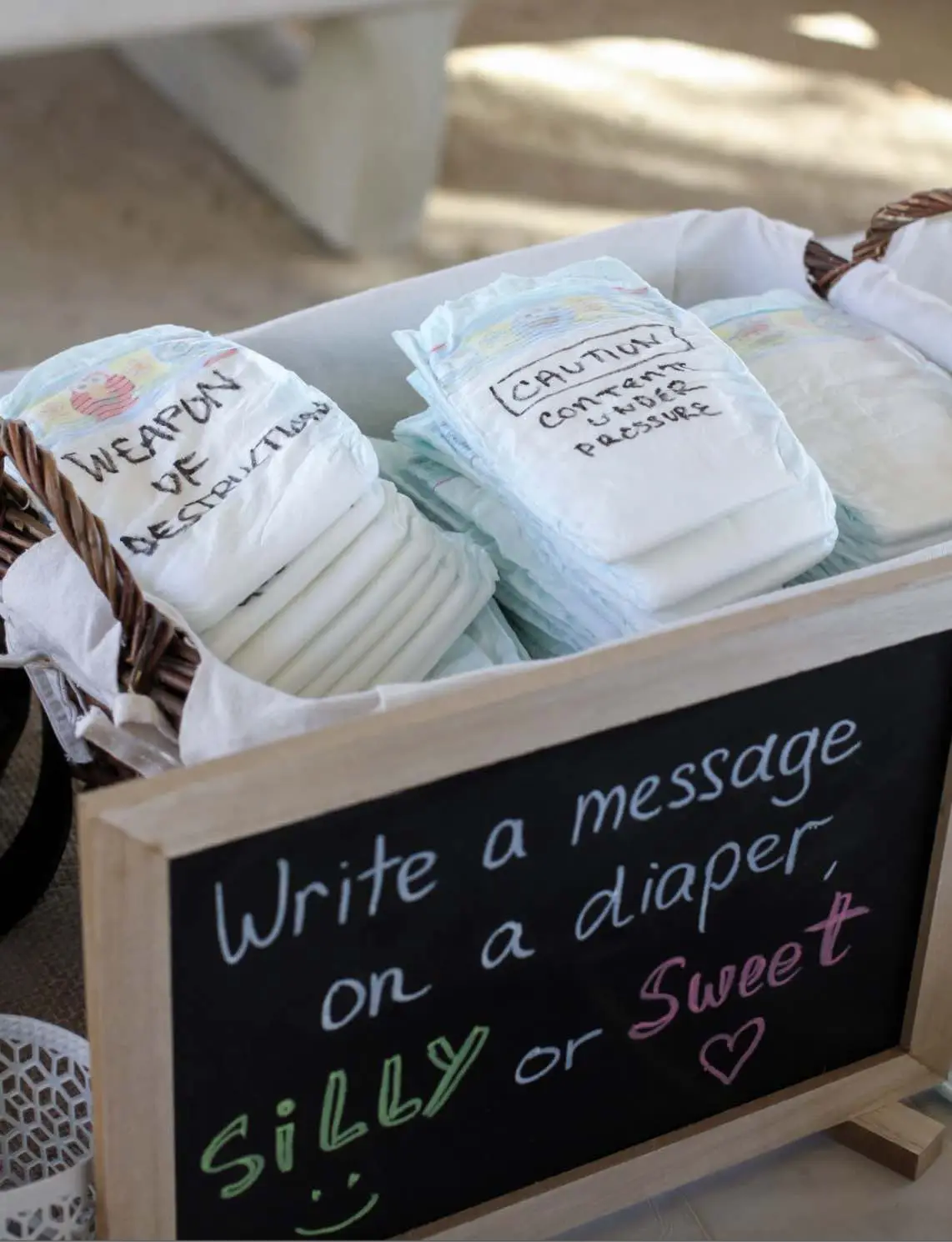 Write a message on a diaper - baby shower activity idea 