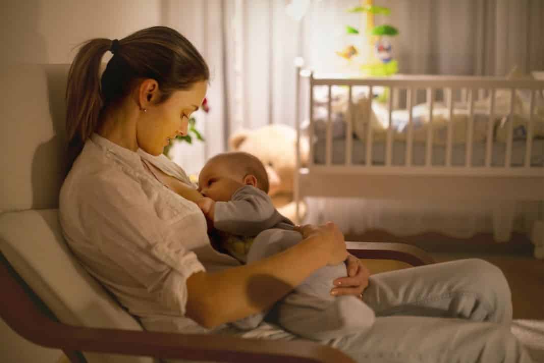 New mum feeds baby late at night
