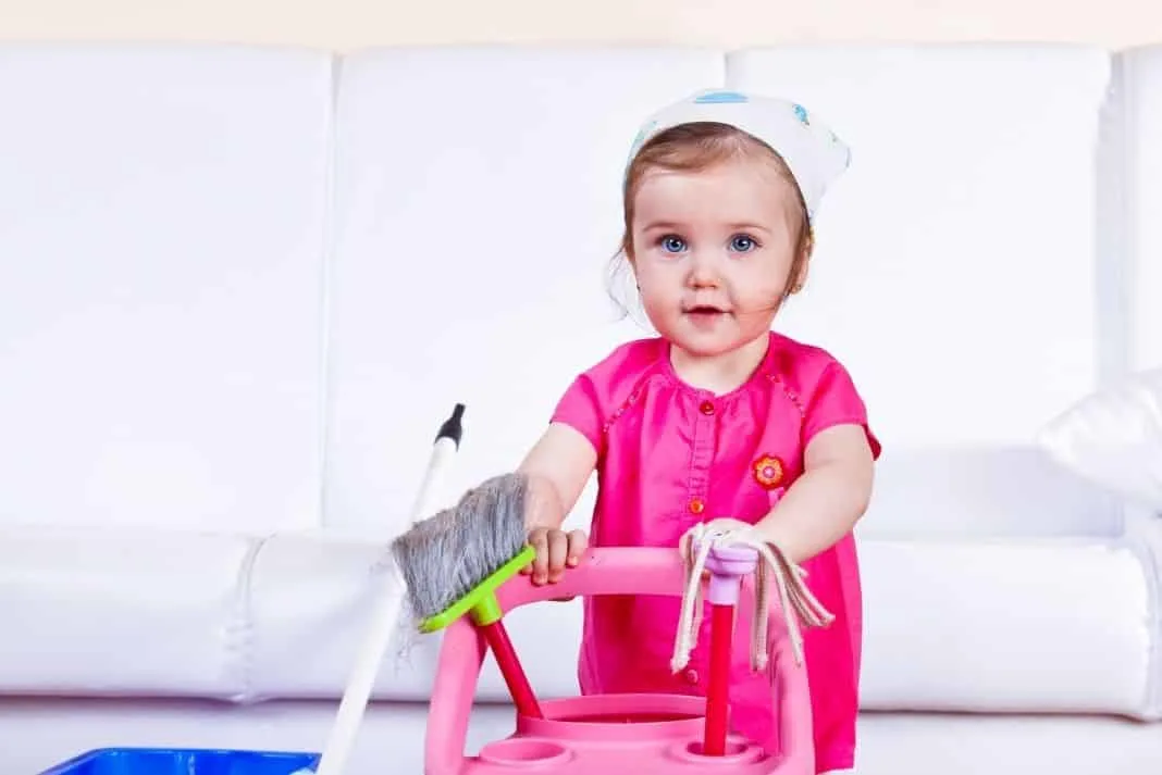 Toddler doing chores