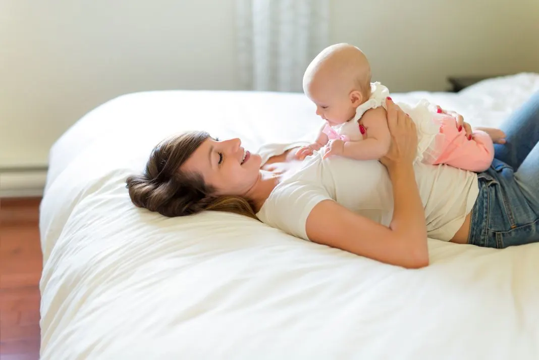 Baby activity with mum 3 months old