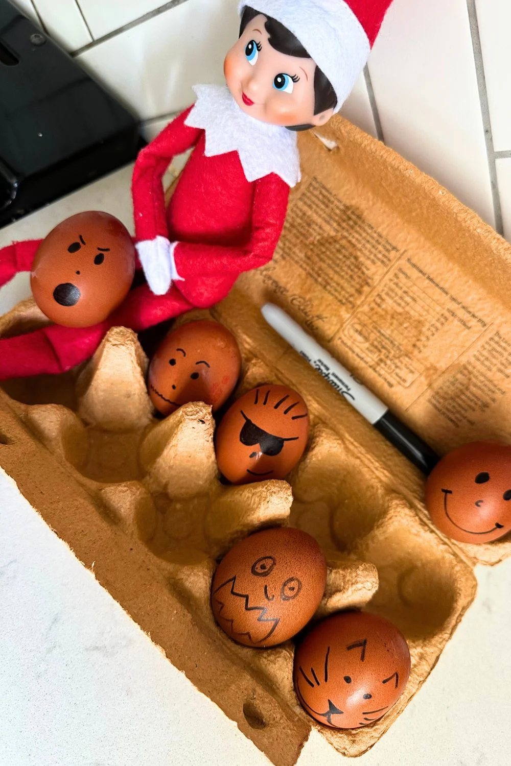 Elf on the Shelf drew faces on eggs